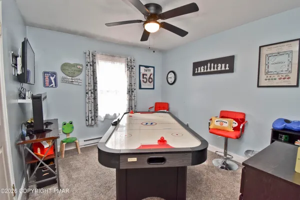 a living room with furniture and a couch