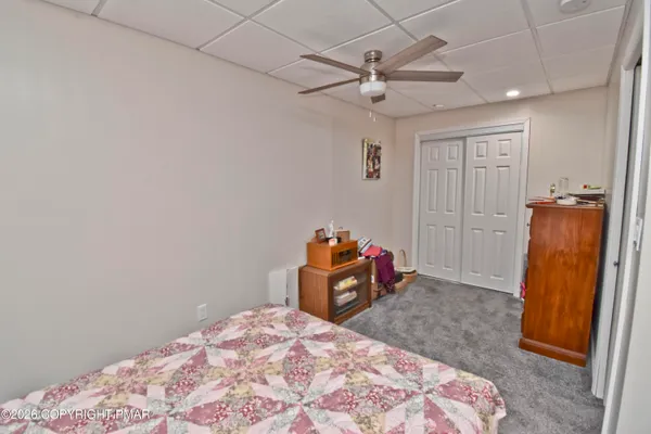 a picture of a bench in front of a building