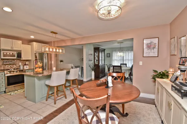 a view of a dining room with furniture