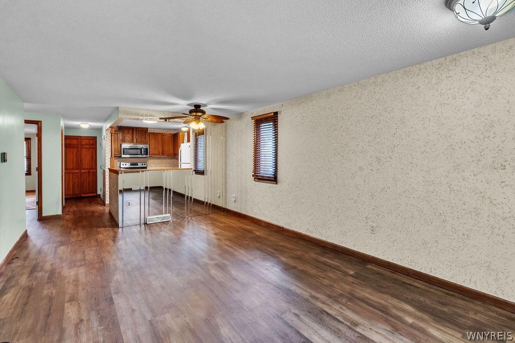 4755 Chestnut Ridge Road, Unit 9 Amherst, NY 14228 - Photo 21 of 46 Dinette/ living room area