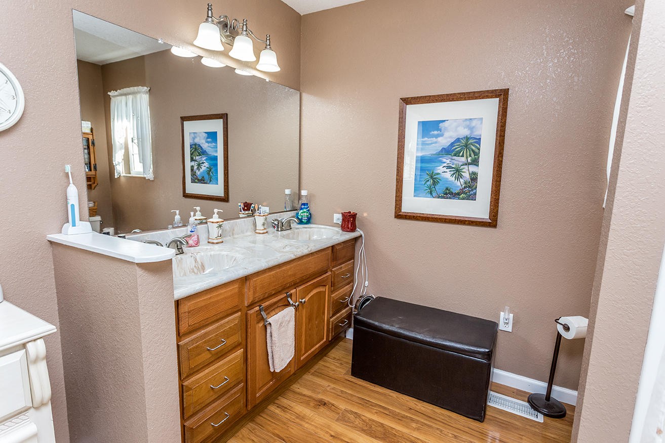 4799 Ross Road Philadelphia, TN 37846 - Photo 14 of 31 a bathroom with a sink a light fixture and a mirror