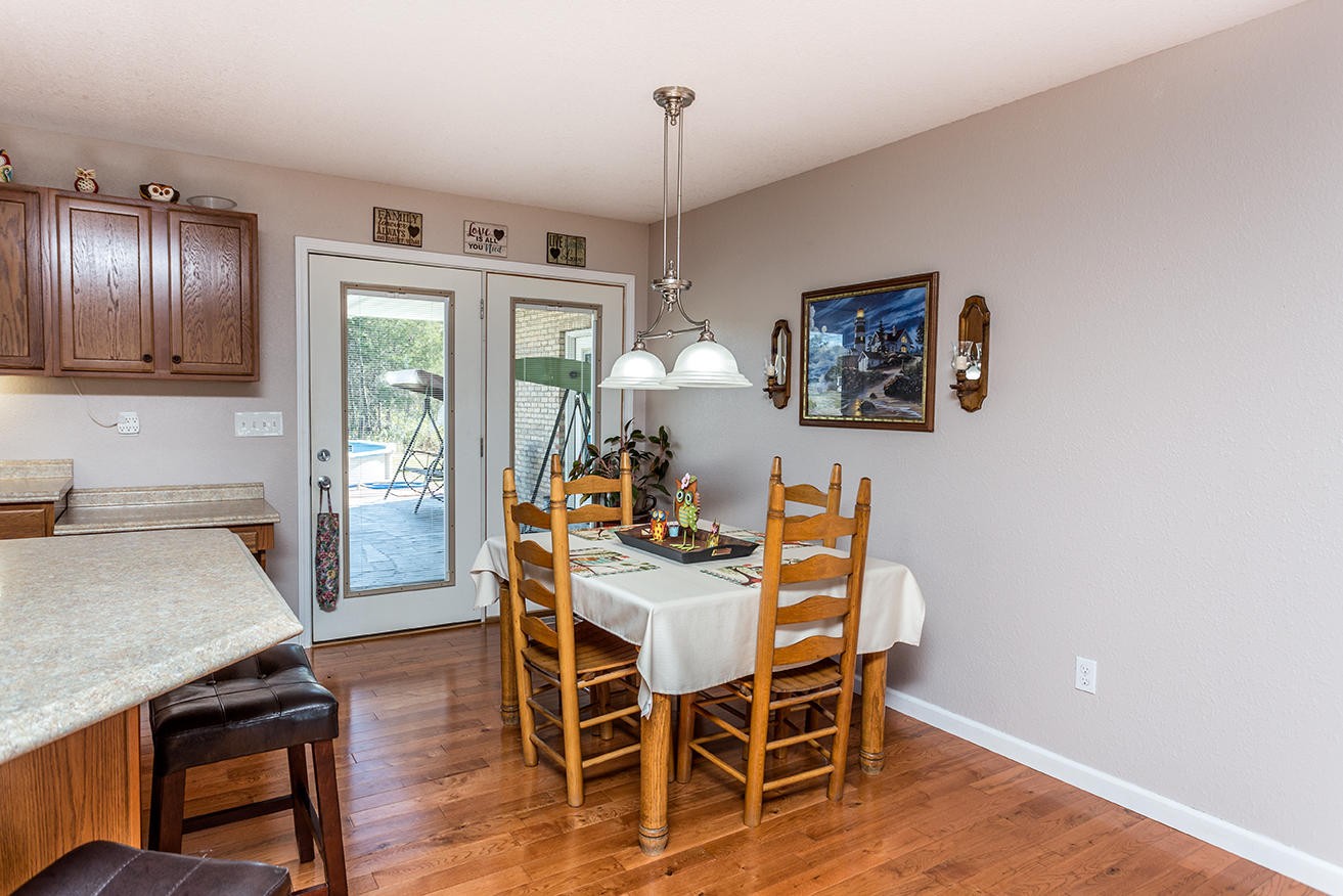 4799 Ross Road Philadelphia, TN 37846 - Photo 7 of 31 a view of a dining room with furniture window and wooden floor