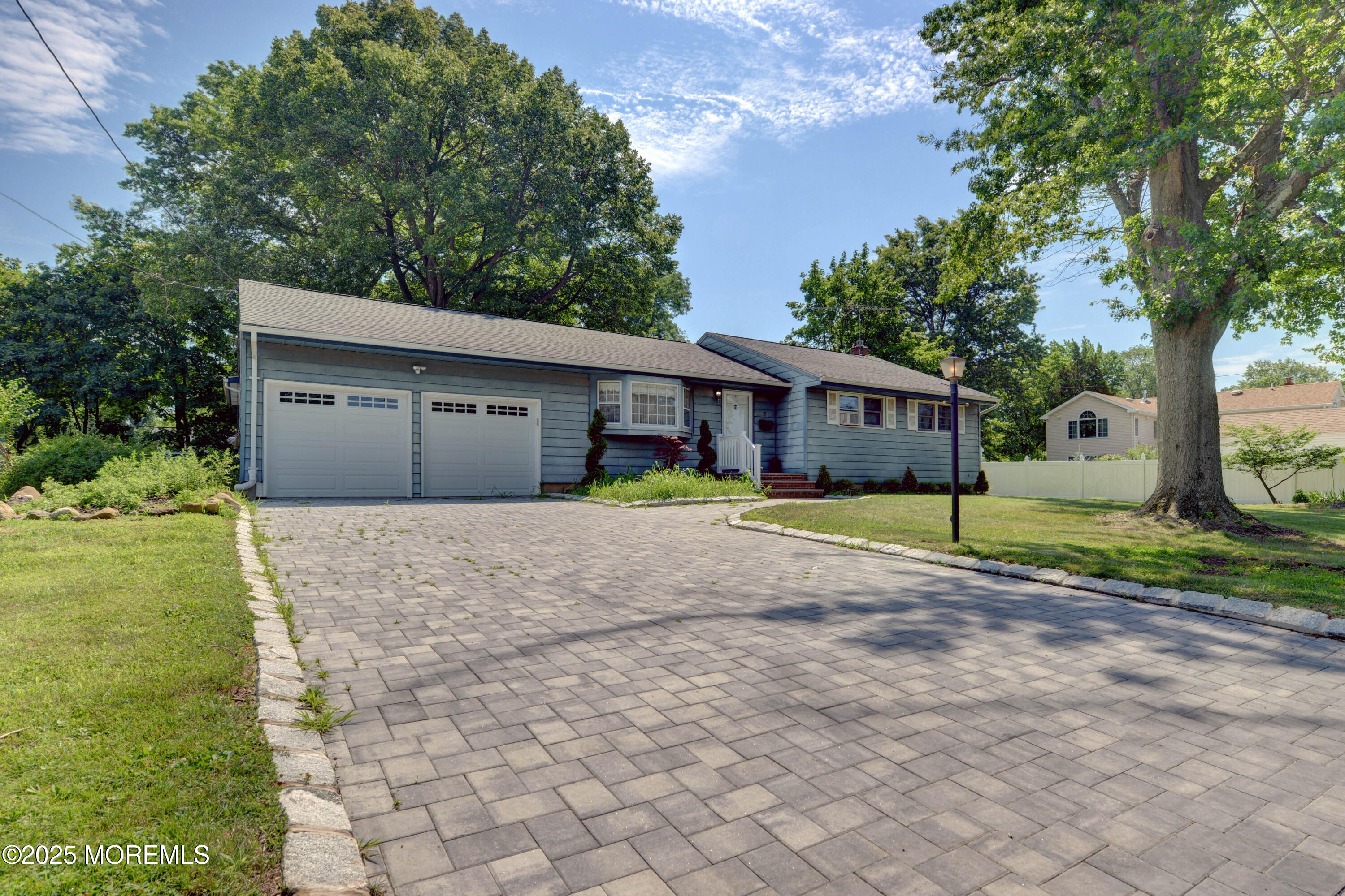 26 Old Manor Road Holmdel, NJ 07733 - Photo 1 of 37 a house view with a garden space