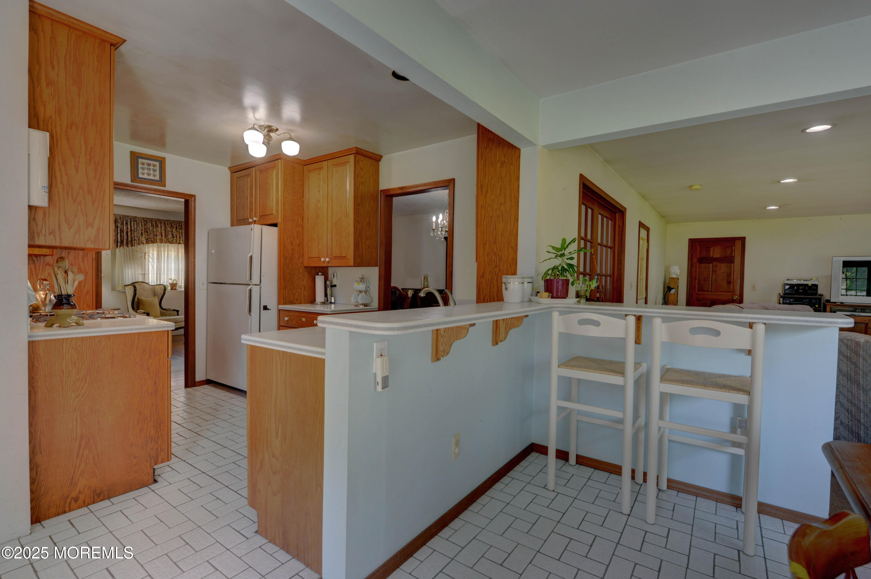 26 Old Manor Road Holmdel, NJ 07733 - Photo 13 of 37 a view of kitchen with cabinets and refrigerator