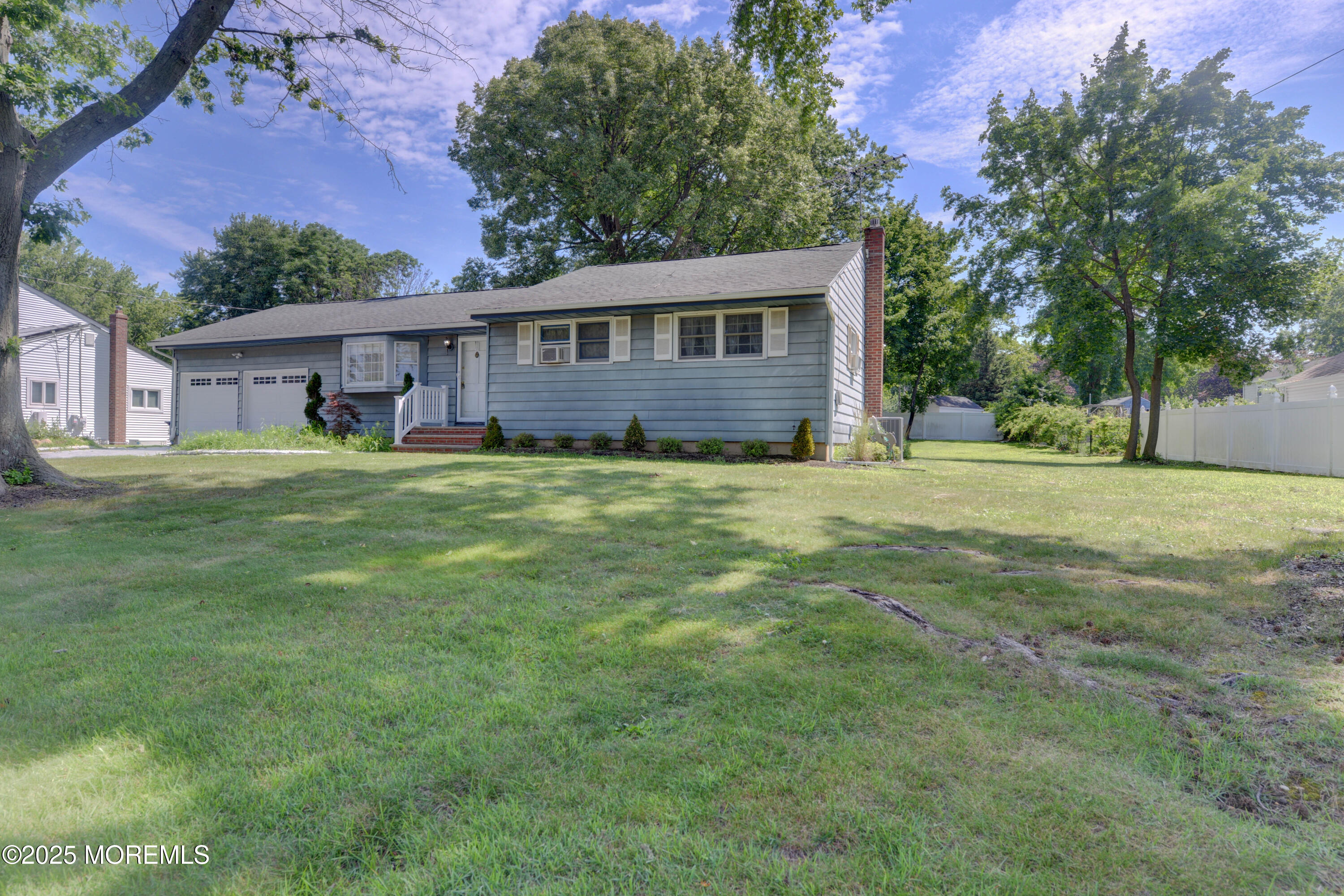 26 Old Manor Road Holmdel, NJ 07733 - Photo 2 of 37 a view of a house with a big yard