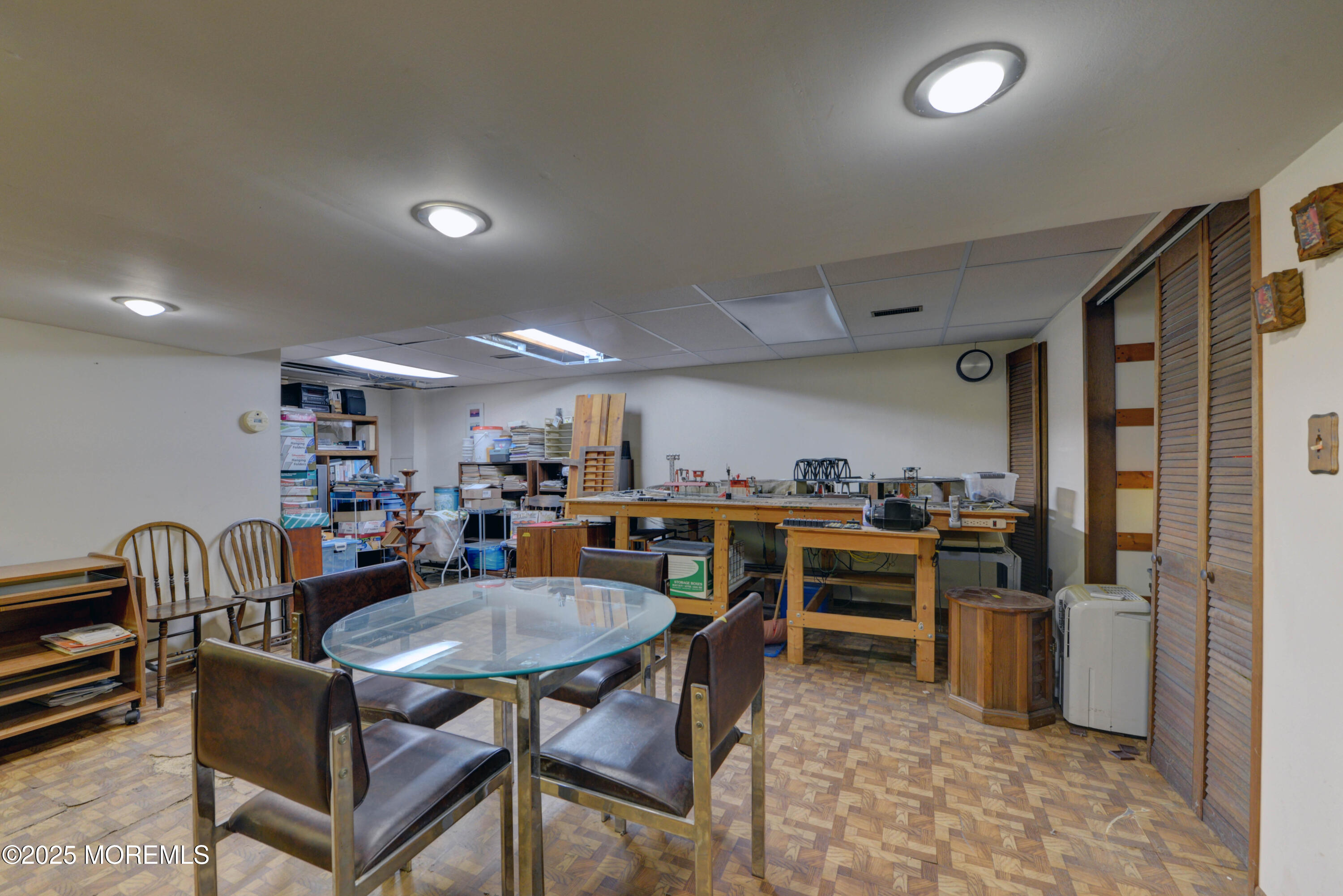 26 Old Manor Road Holmdel, NJ 07733 - Photo 26 of 37 a view of a dining room with furniture