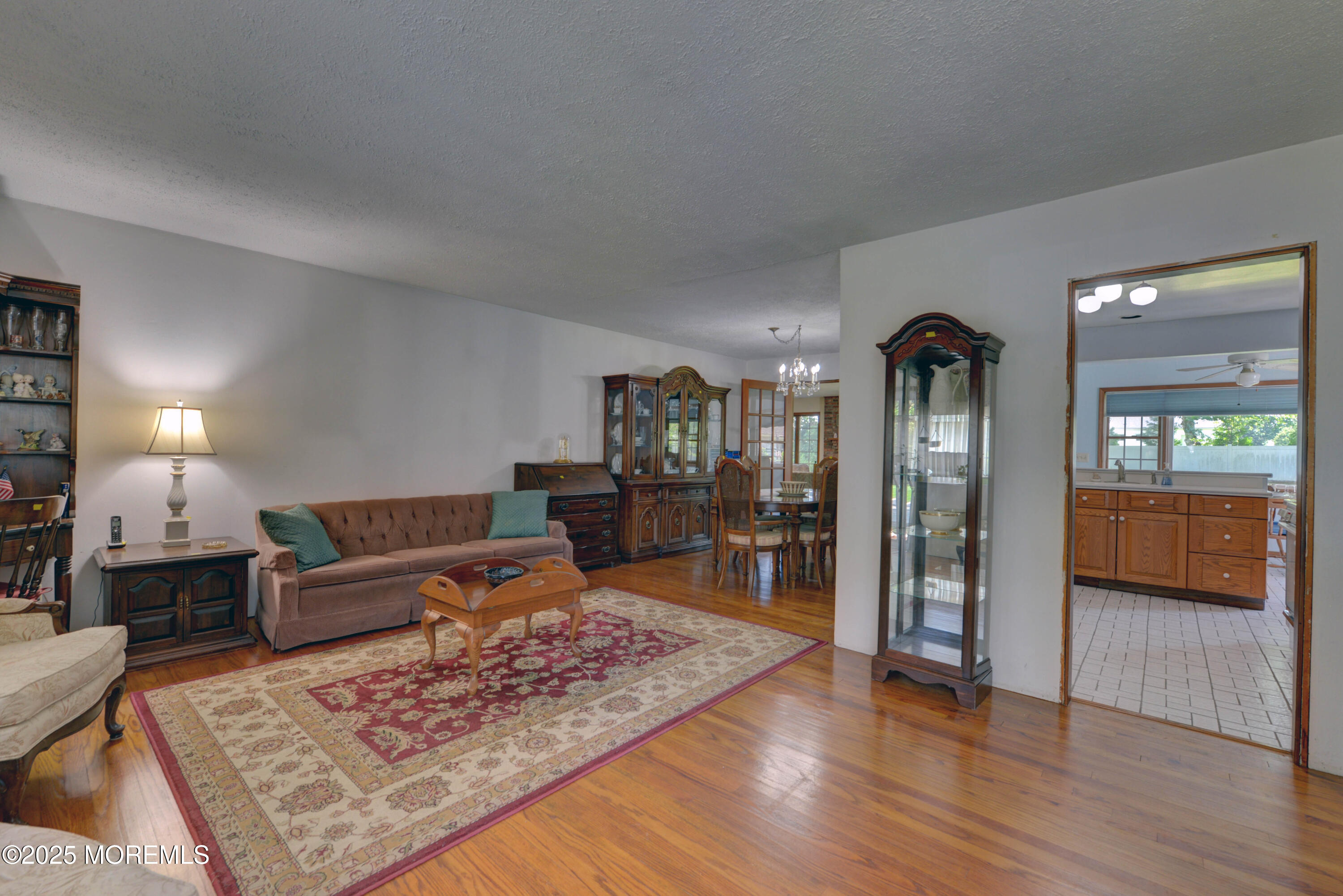 26 Old Manor Road Holmdel, NJ 07733 - Photo 4 of 37 a living room with furniture and wooden floor