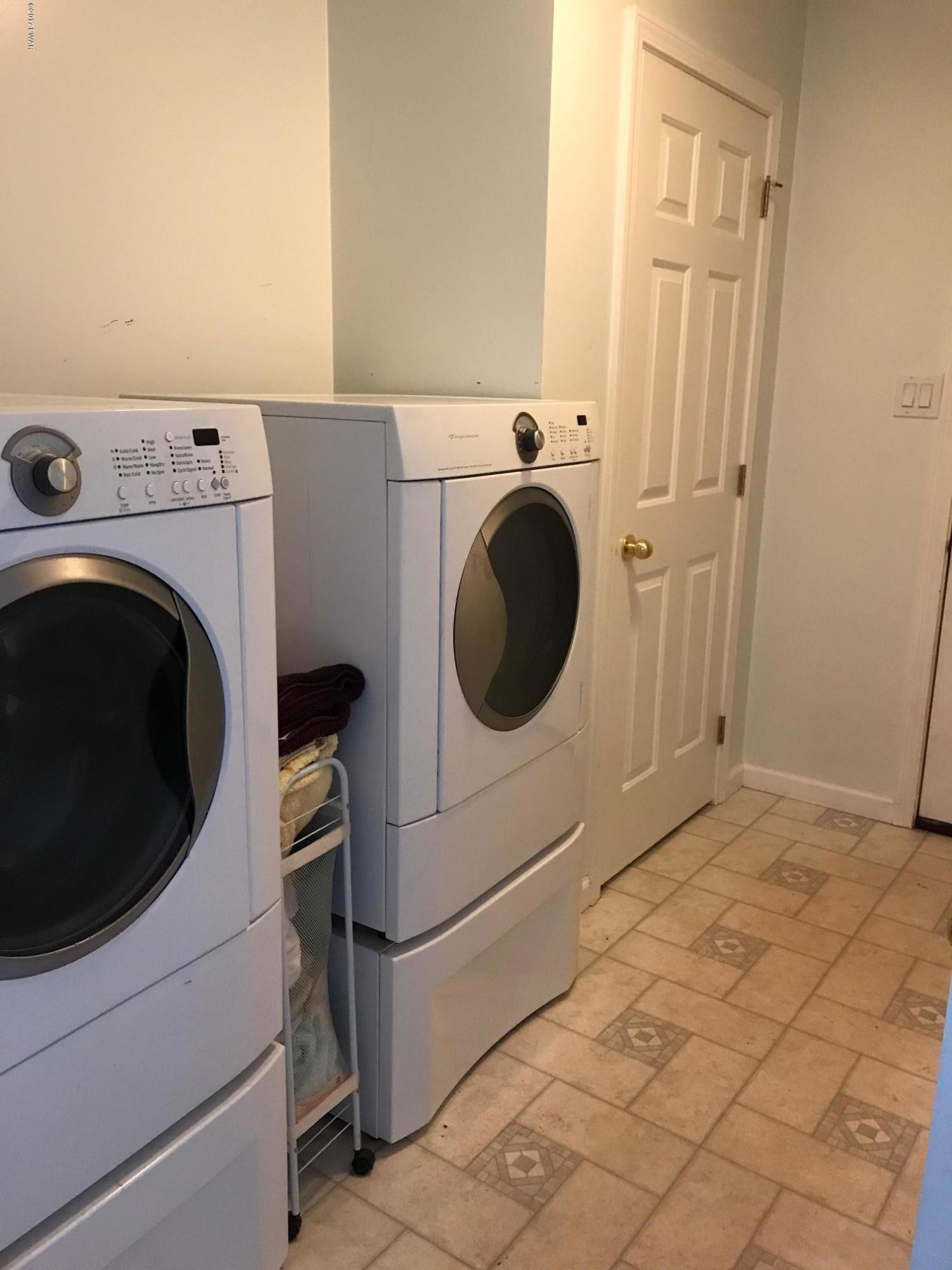 82 Slater Road Beach Lake, PA 18405 - Photo 11 of 28 a utility room with dryer and washer