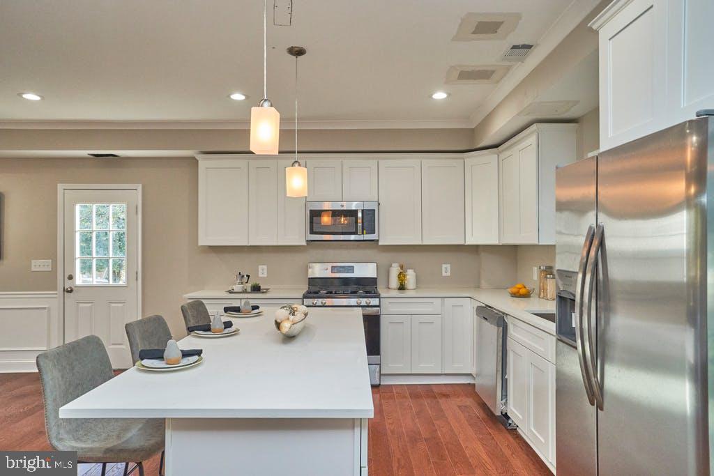 3244 Blundell Road Falls Church, VA 22042 - Photo 5 of 43 a kitchen with a sink stainless steel appliances and window