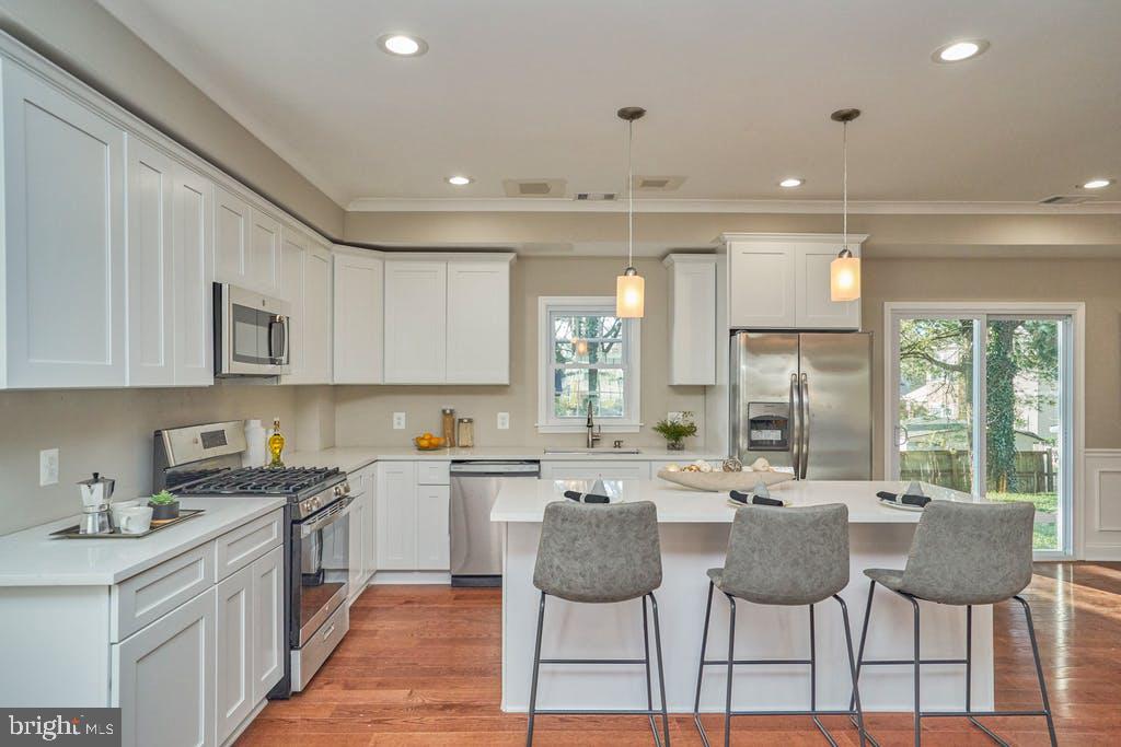 3244 Blundell Road Falls Church, VA 22042 - Photo 8 of 43 a kitchen with a sink cabinets and window