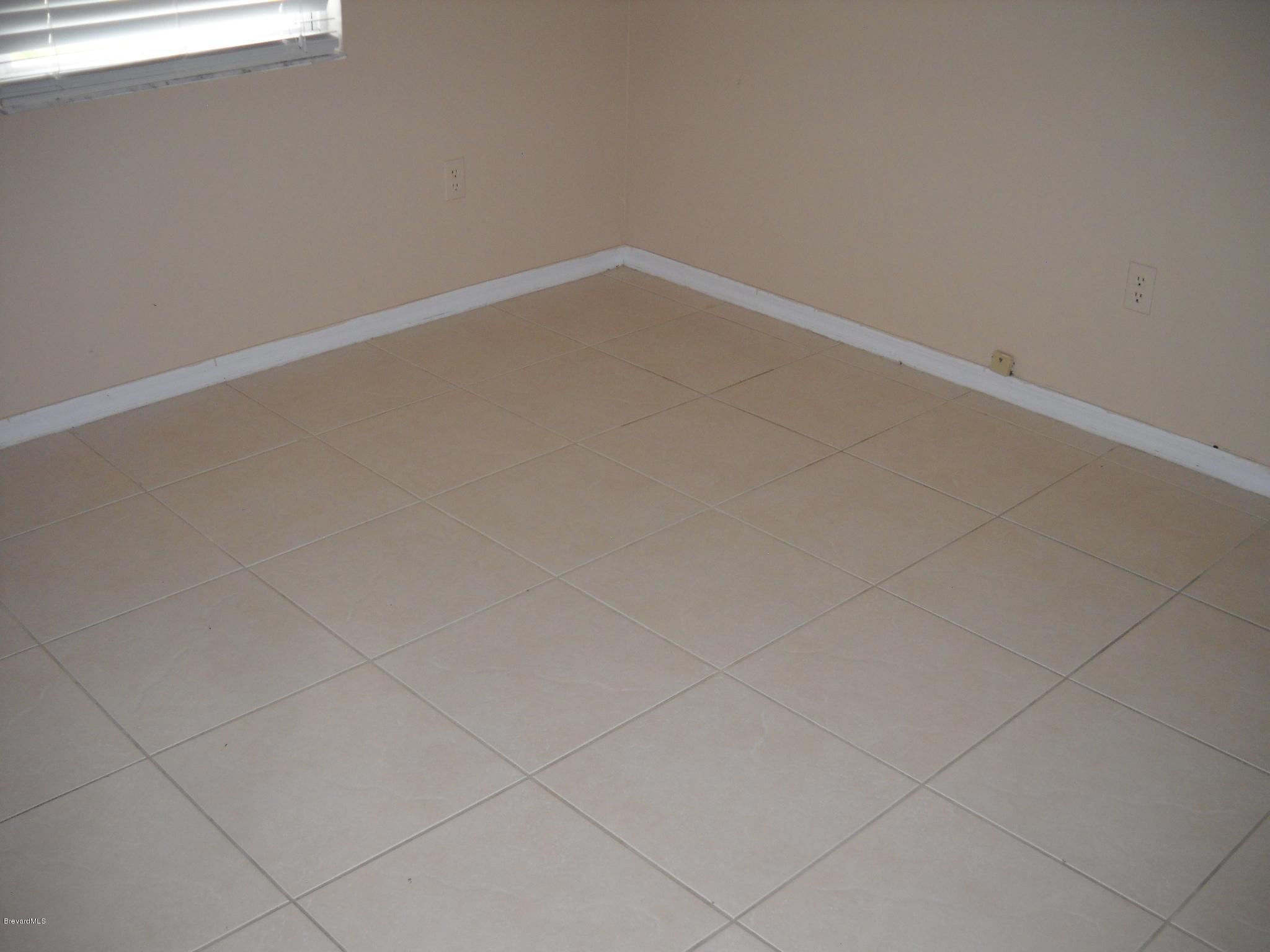 6468 Hudson Road Cocoa, FL 32927 - Photo 10 of 18 3rd bedroom flooring