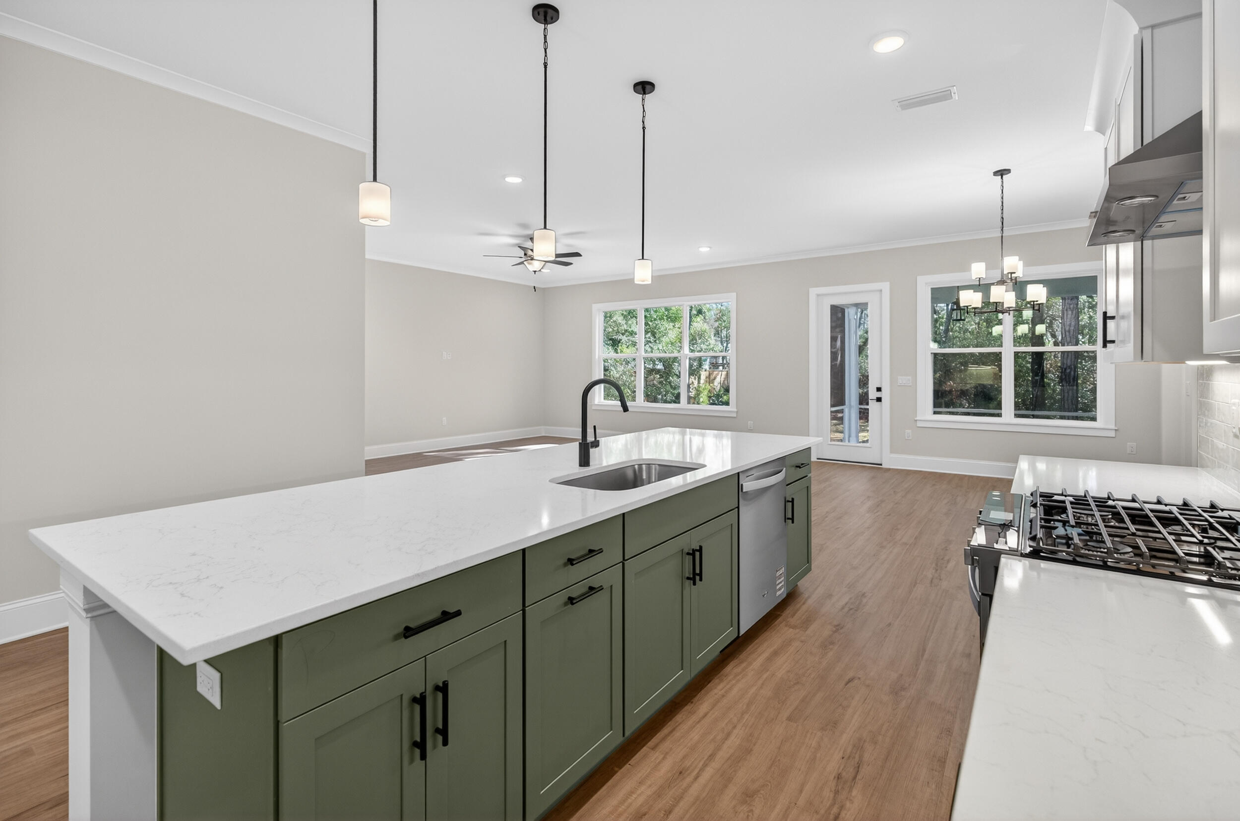 397 North J Hunter's Way, Unit LOT 36 Freeport, FL 32439 - Photo 20 of 54 a kitchen with counter top space and sink