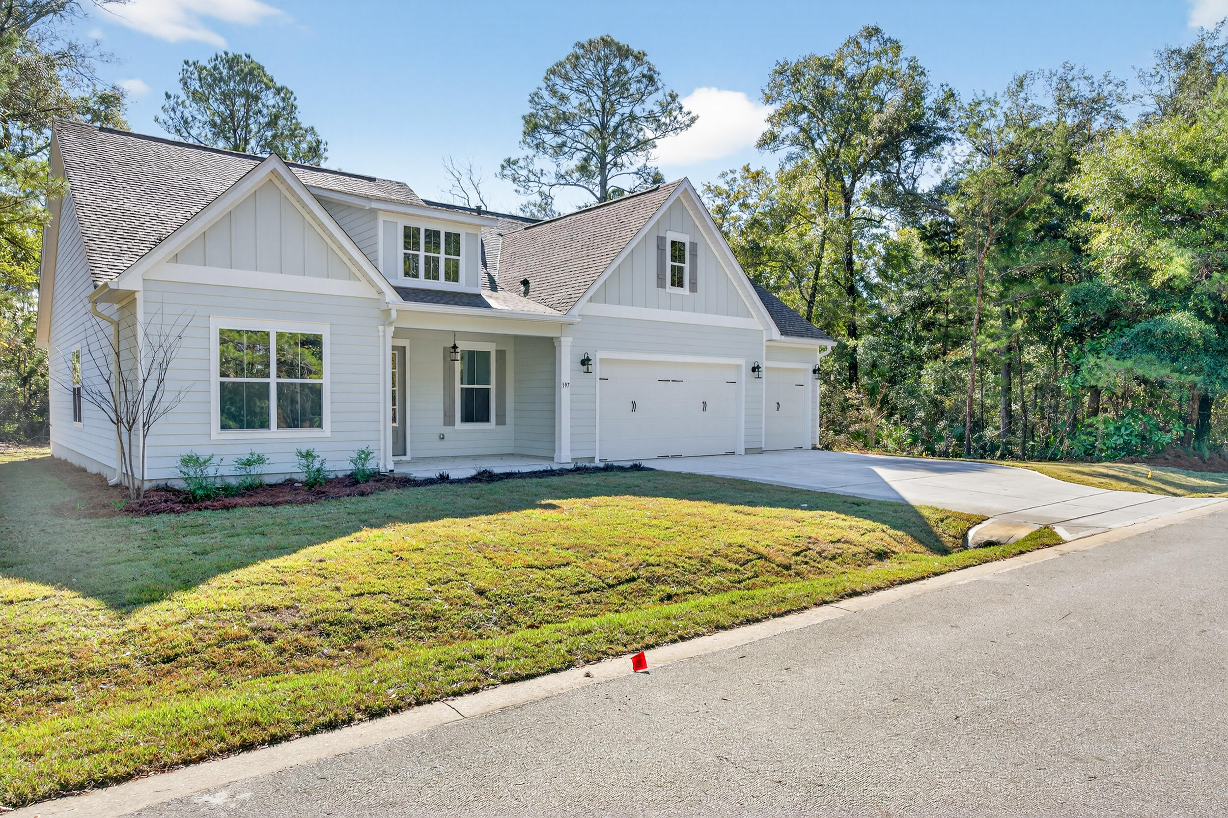 397 North J Hunter's Way, Unit LOT 36 Freeport, FL 32439 - Photo 2 of 54 front view of house with yard