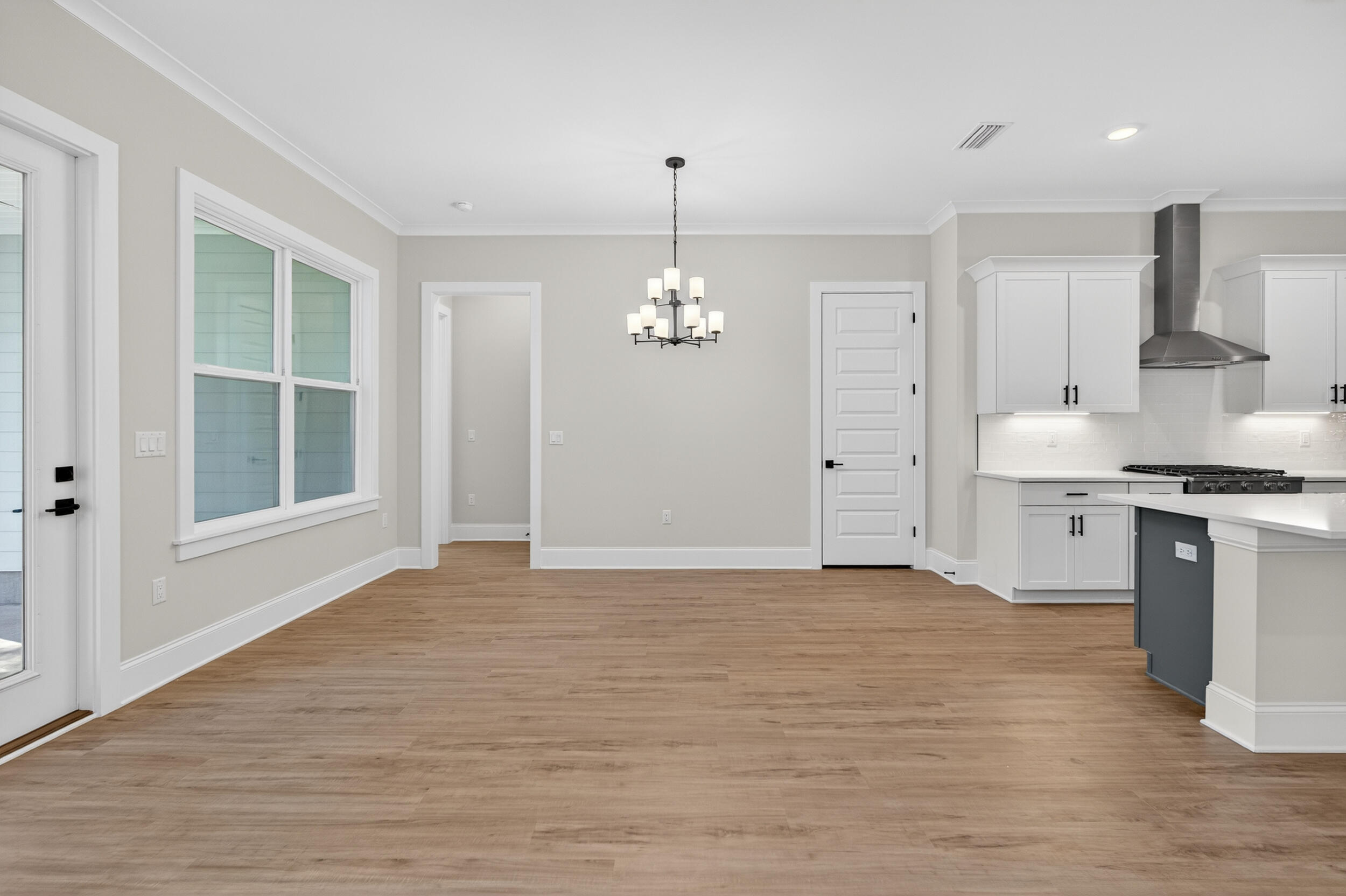 397 North J Hunter's Way, Unit LOT 36 Freeport, FL 32439 - Photo 25 of 54 a view of an empty room with window and cabinet