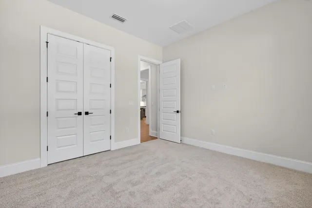 an aerial view of a house with yard