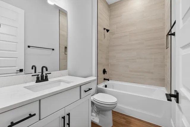 a view of a house with a balcony and stairs