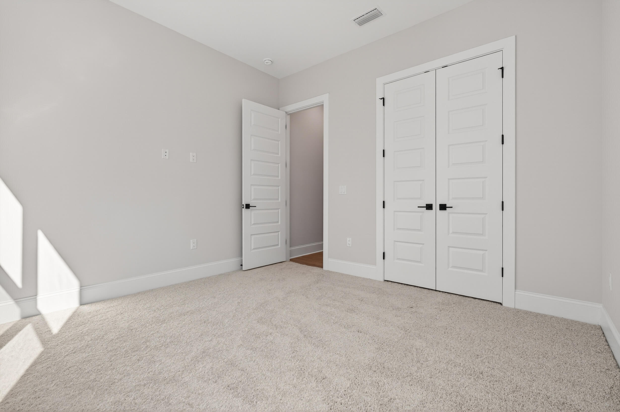 397 North J Hunter's Way, Unit LOT 36 Freeport, FL 32439 - Photo 39 of 54 a view of an empty room