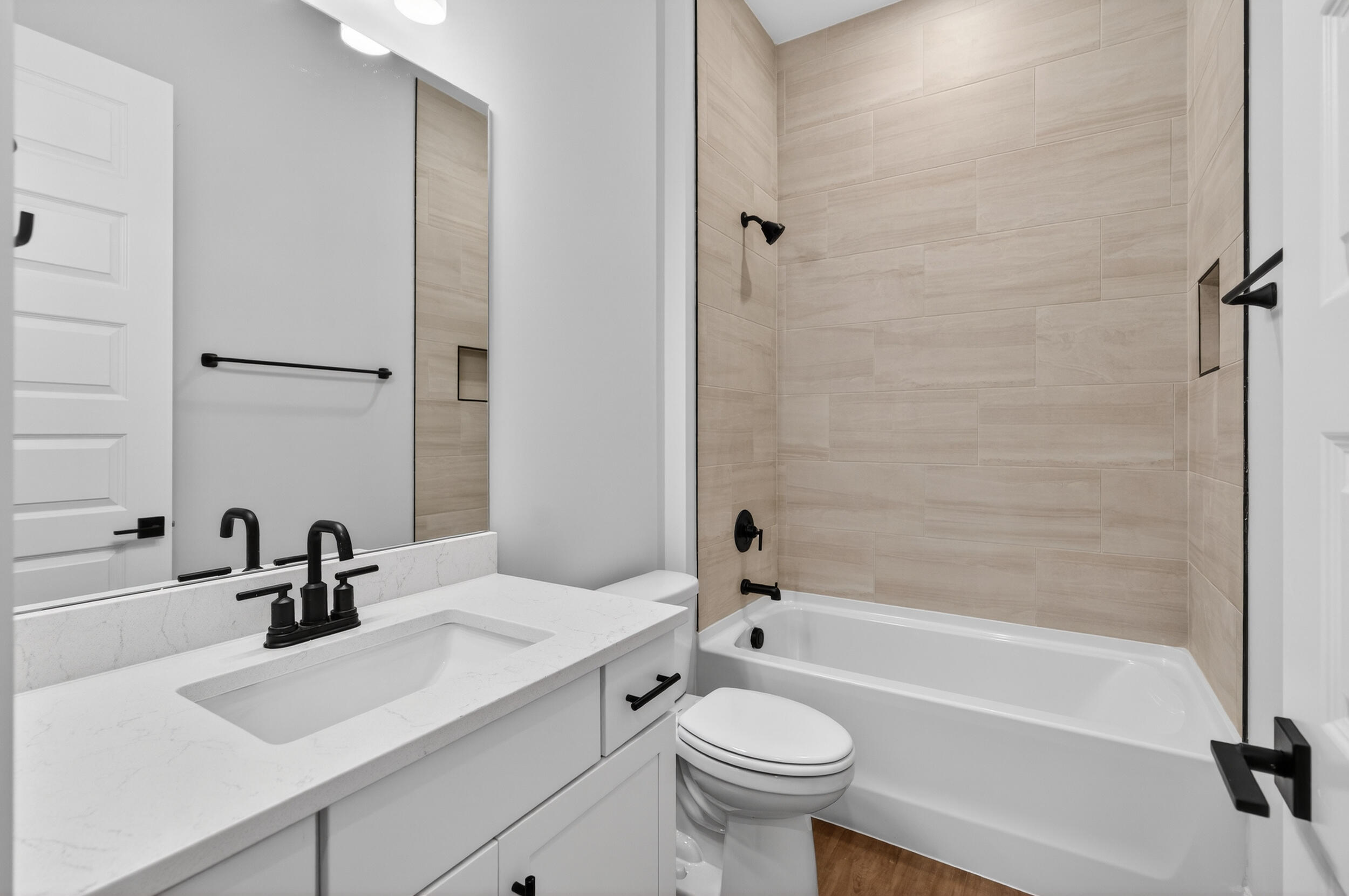 397 North J Hunter's Way, Unit LOT 36 Freeport, FL 32439 - Photo 40 of 54 a bathroom with a sink a toilet and bathtub