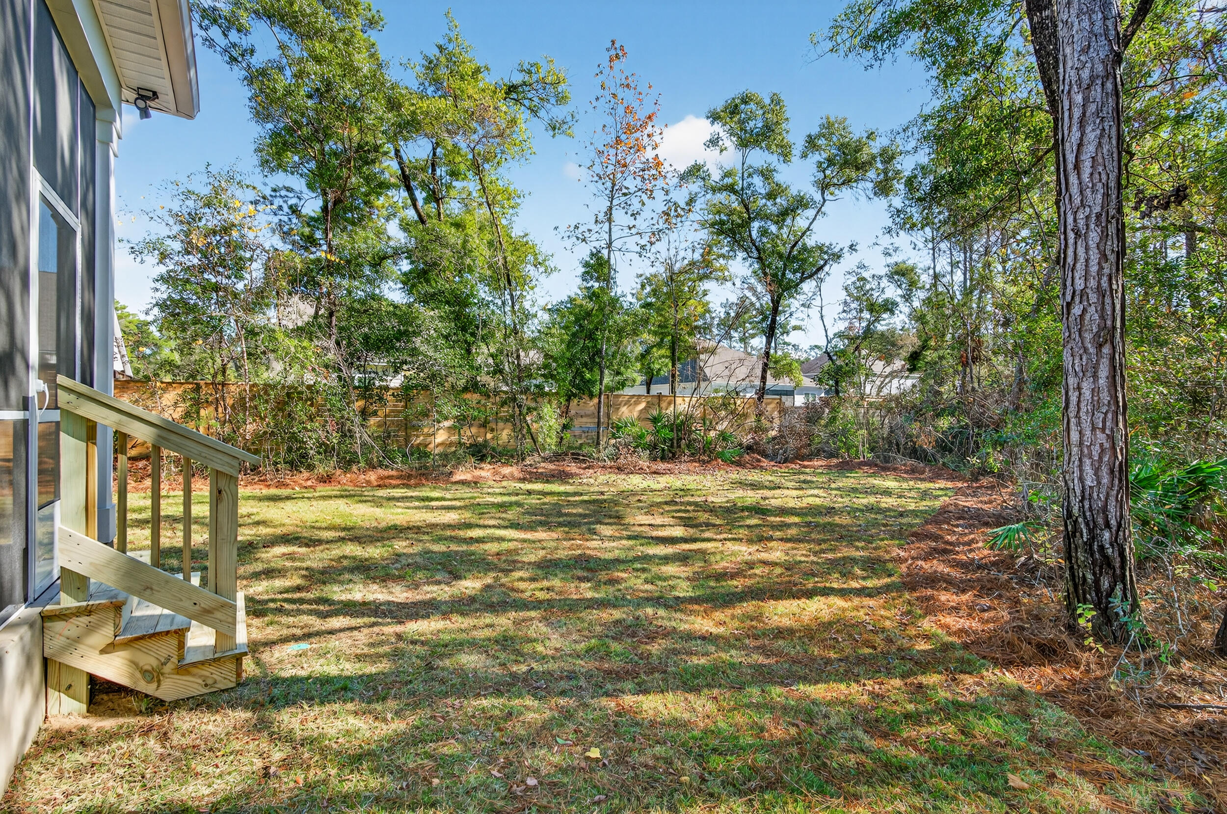 397 North J Hunter's Way, Unit LOT 36 Freeport, FL 32439 - Photo 8 of 54 a view of a yard with an outdoor space