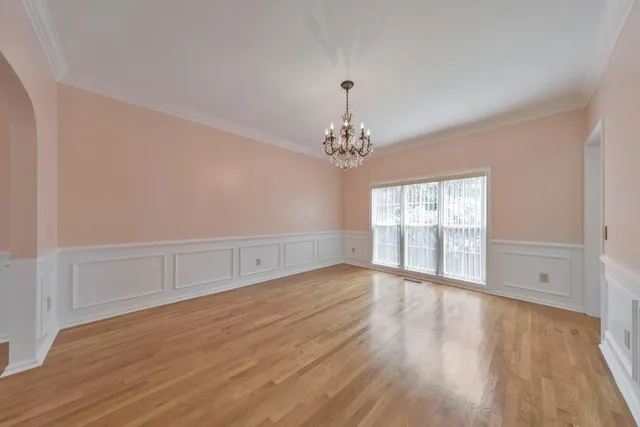 a kitchen with granite countertop a sink and cabinets