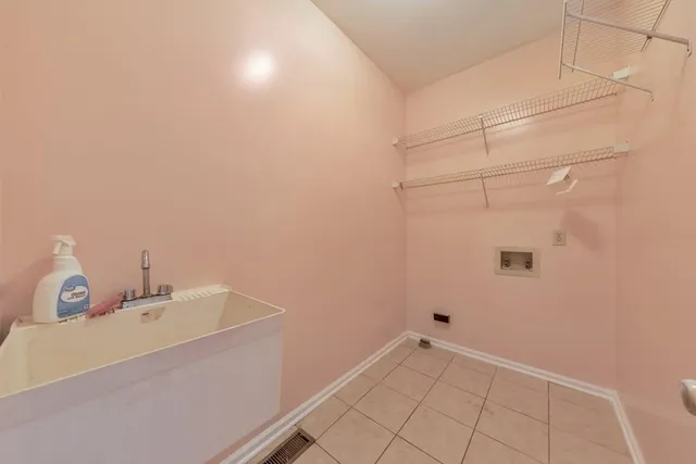 a view of a room with racks on the wall