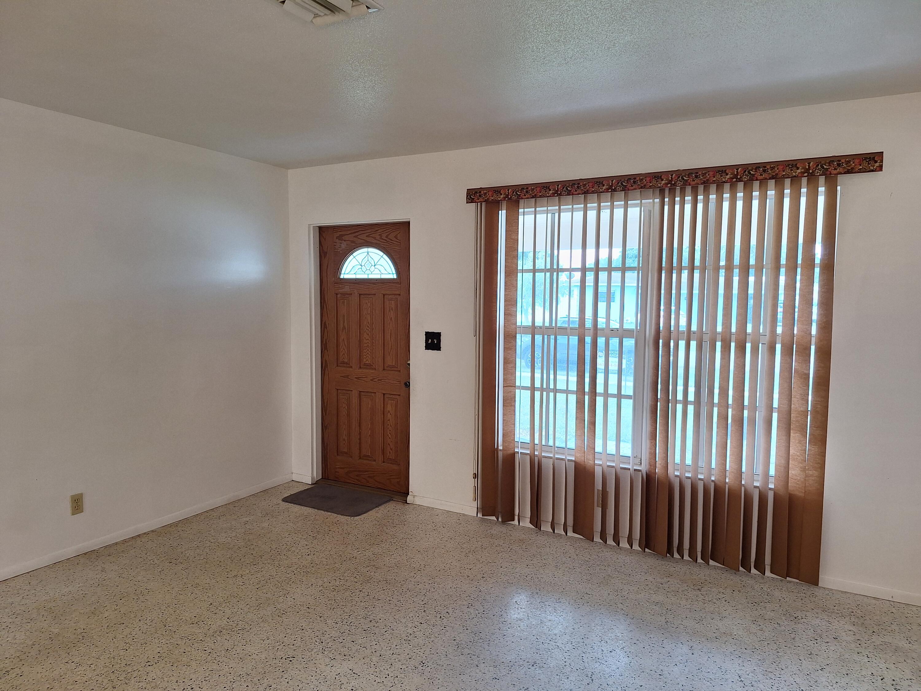 2596 Rosehaven Road West Palm Beach, FL 33415 - Photo 4 of 26 20251207_113645