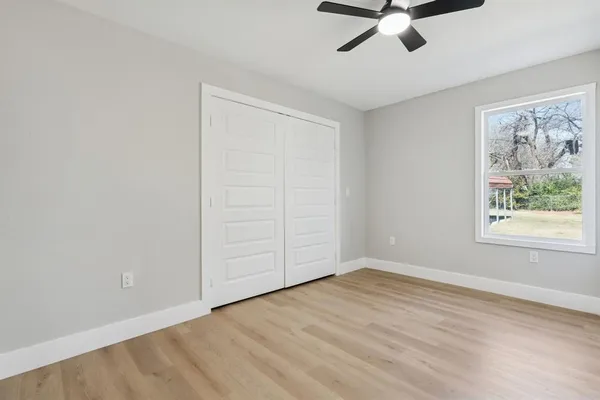 a kitchen with stainless steel appliances granite countertop a sink and a stove top oven