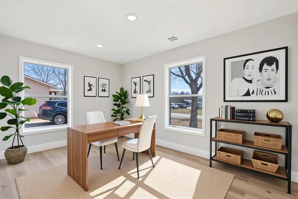 a kitchen with sink and window