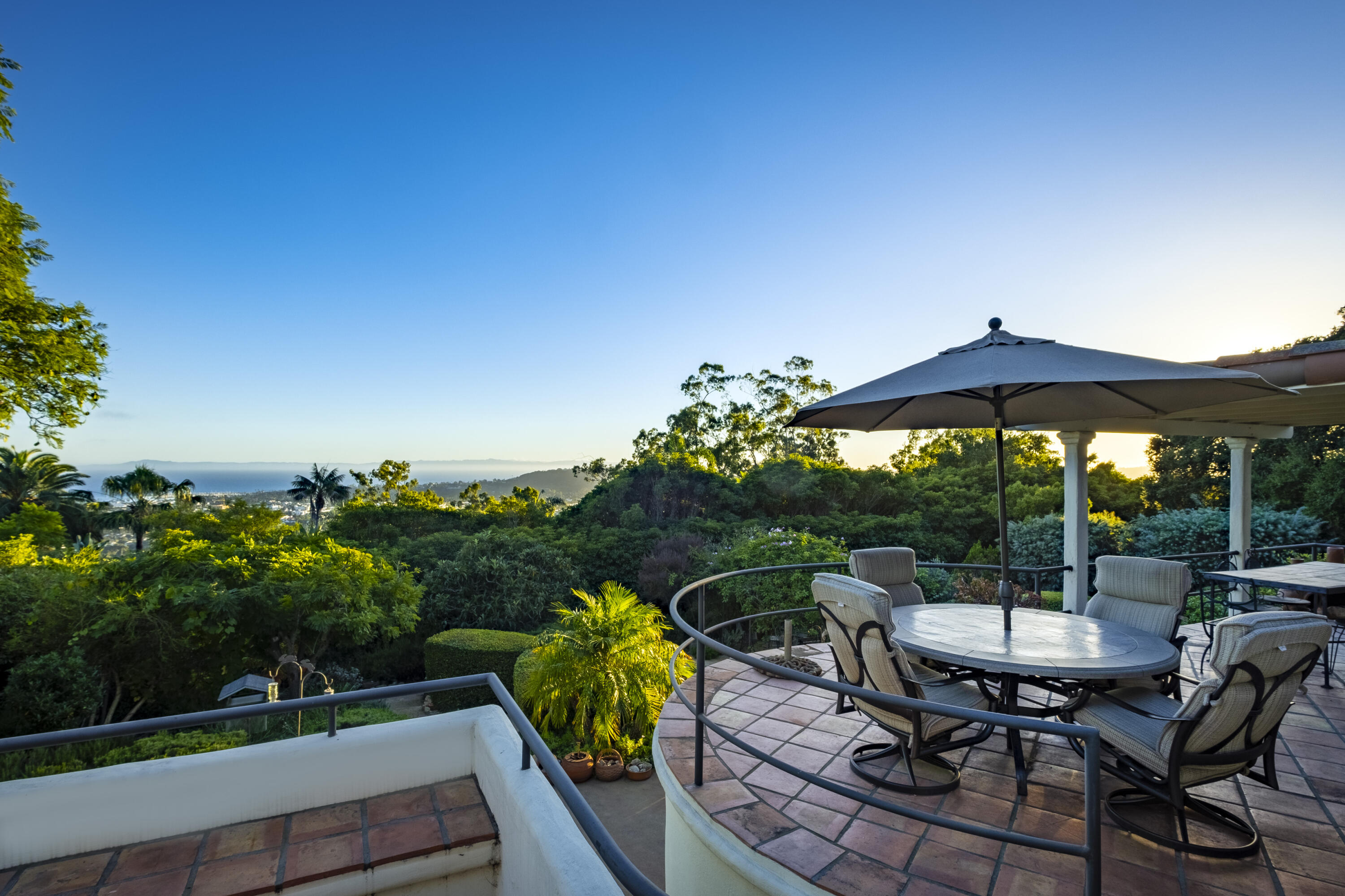 1611 Paterna Road Santa Barbara, CA 93103 - Photo 9 of 13 a view of a chairs and table in patio with a yard