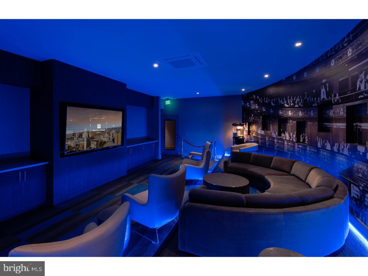 200 North 16th Street, Unit 2018 Philadelphia, PA 19102 - Photo 14 of 20 a living room with furniture and a flat screen tv