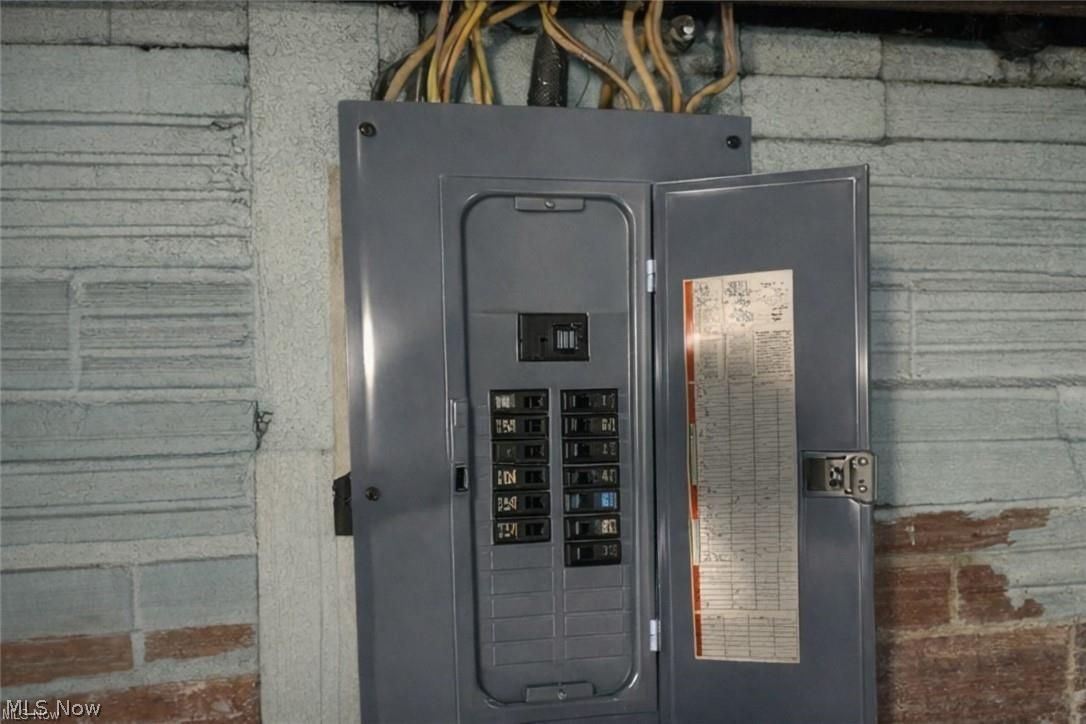 1911 Youngstown Road Southeast Warren, OH 44484 - Photo 14 of 17 Utility room with electric panel