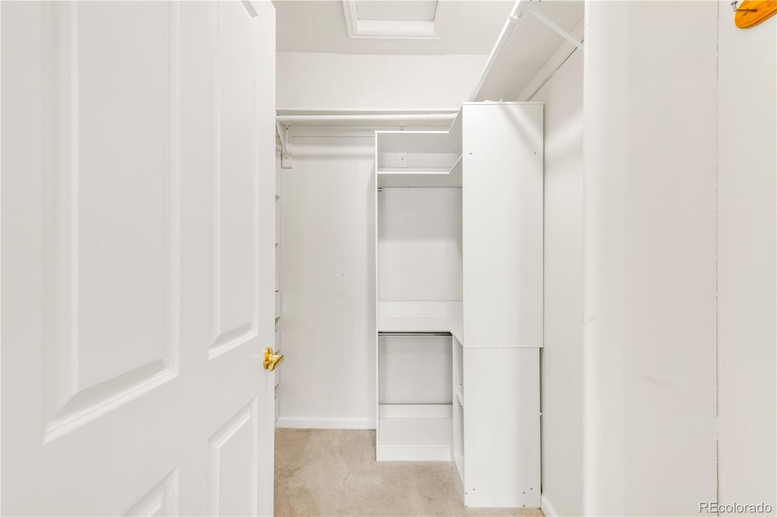 8456 South Hoyt Way, Unit 301 Littleton, CO 80128 - Photo 20 of 31 a close view of cabinet with two white walls