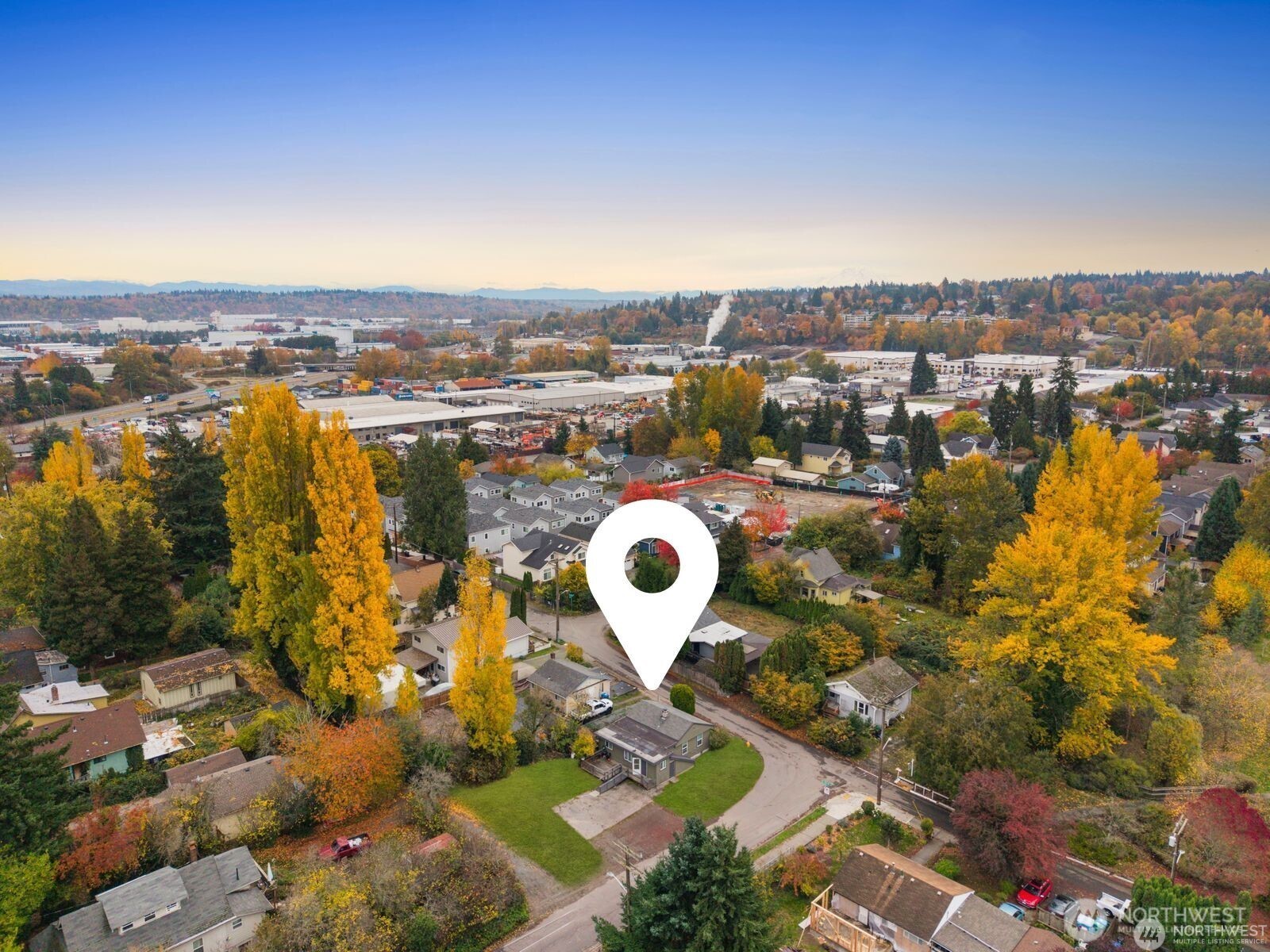 9018 7th Avenue South Seattle, WA 98108 - Photo 10 of 11 an aerial view of a house with a swimming pool outdoor seating and yard