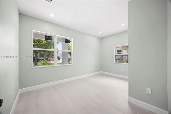 an empty room with windows