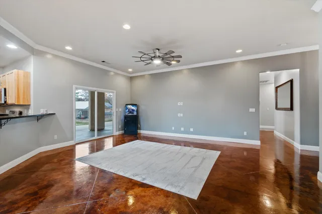 a view of a hallway with a kitchen
