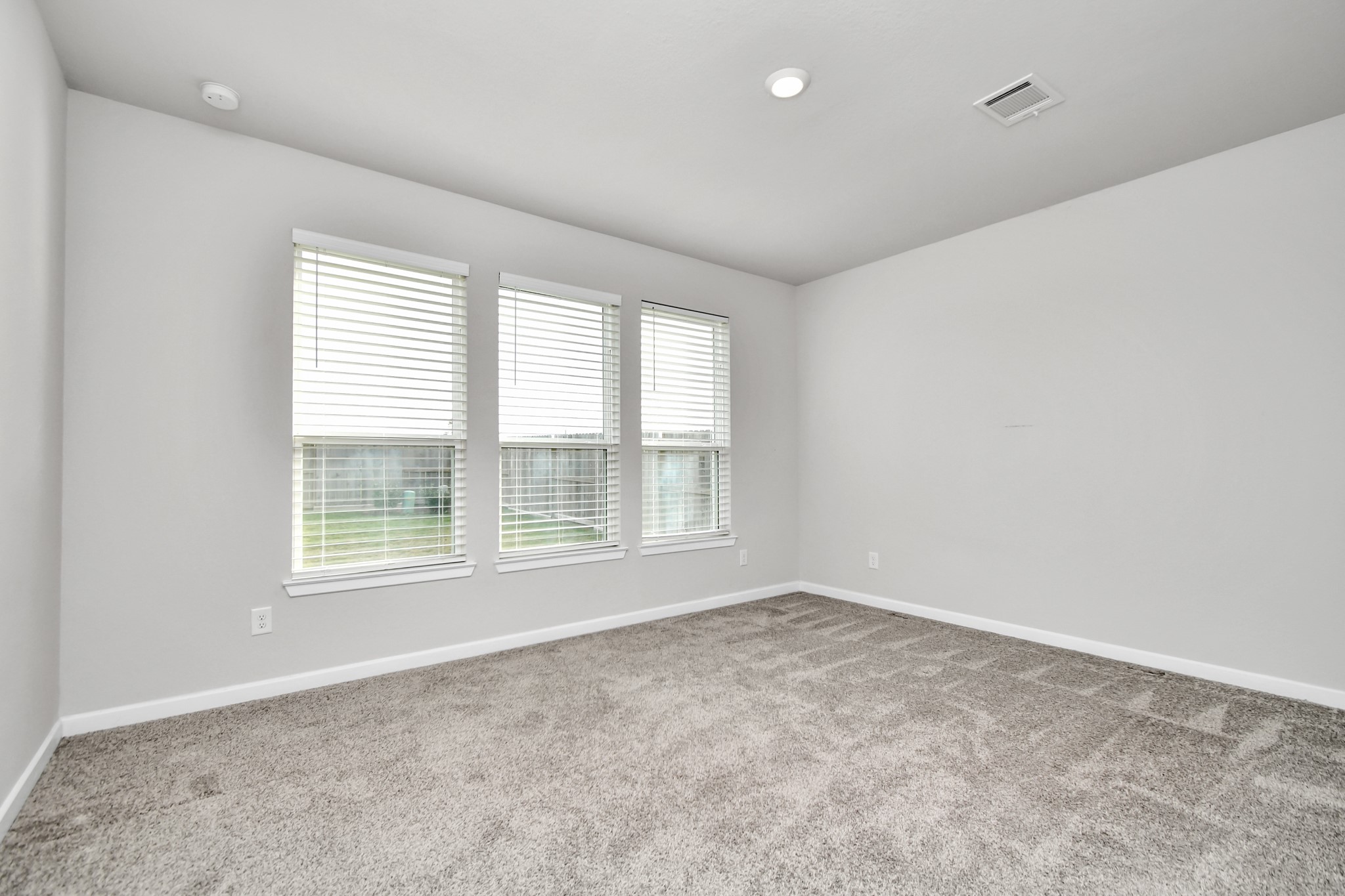 1218 Raburn Run Lane Tomball, TX 77375 - Photo 16 of 37 an empty room with a window