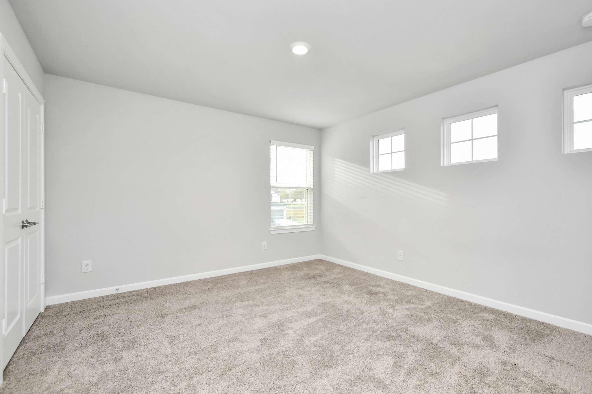 1218 Raburn Run Lane Tomball, TX 77375 - Photo 25 of 37 a view of an empty room with a window