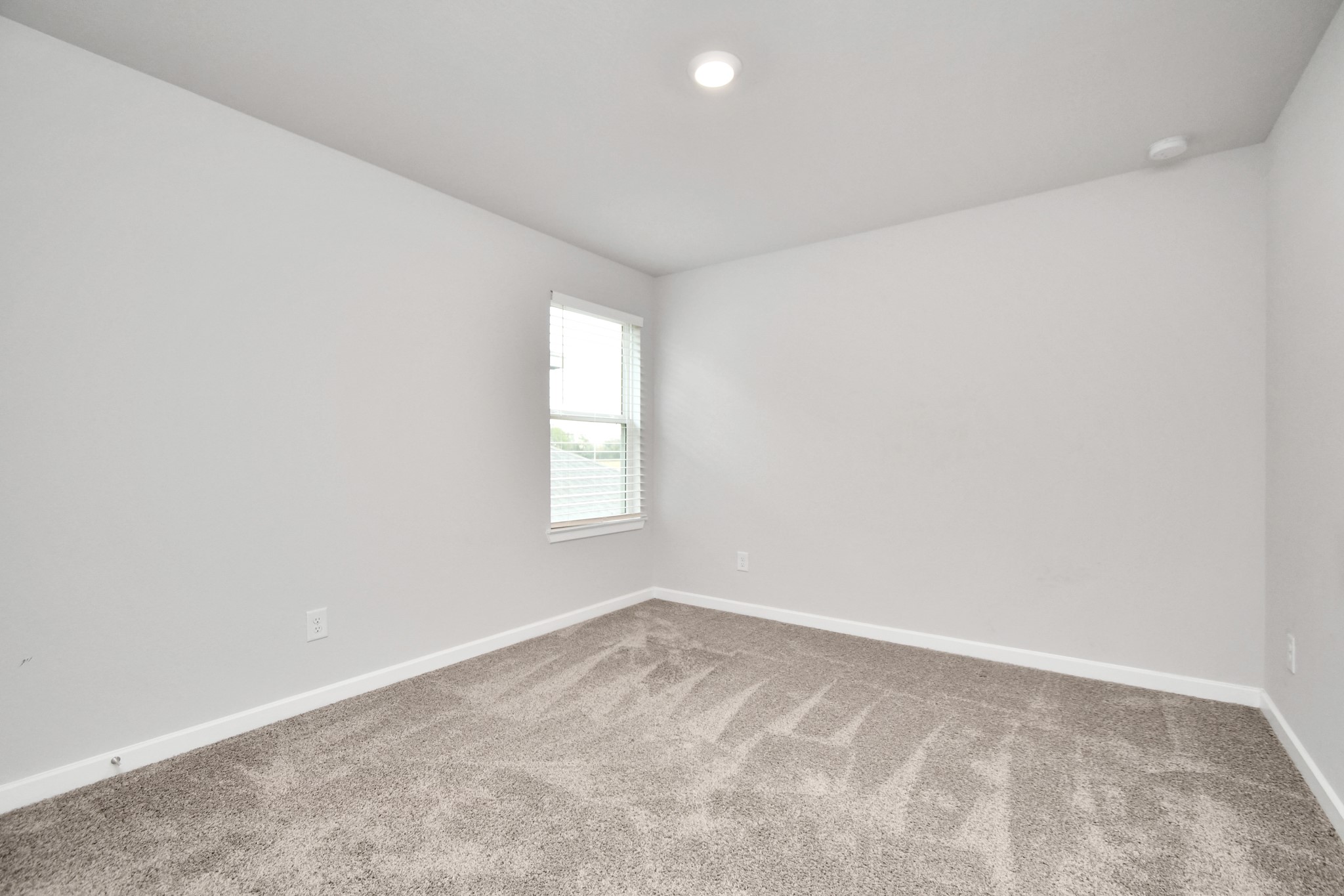1218 Raburn Run Lane Tomball, TX 77375 - Photo 27 of 37 an empty room with a window