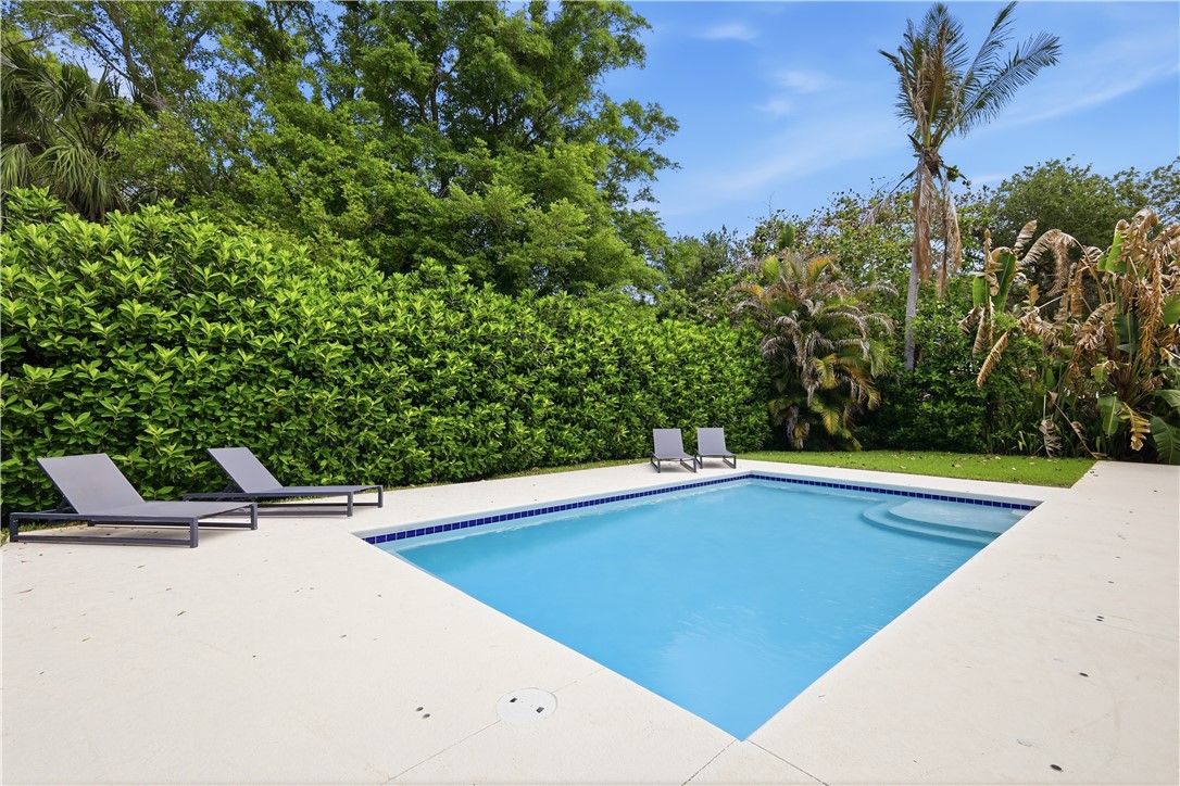 2116 Cavalla Road Vero Beach, FL 32963 - Photo 19 of 23 a view of a swimming pool with an outdoor space