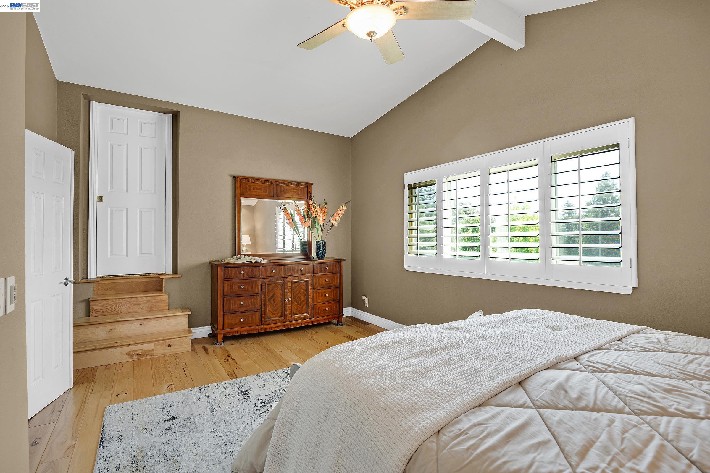 17 Suva Court San Ramon, CA 94582 - Photo 18 of 47 a bedroom with a bed and a dresser