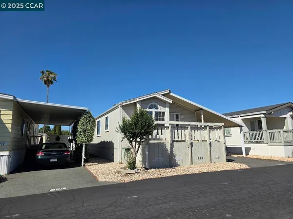 a front view of a house with a garage