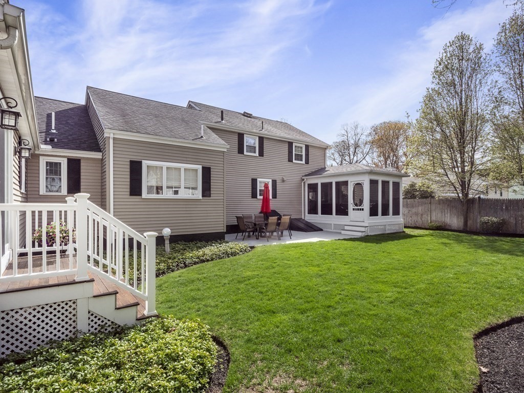 43 Windsor Road Stoneham, MA 02180 - Photo 17 of 42 a view of a house with a yard