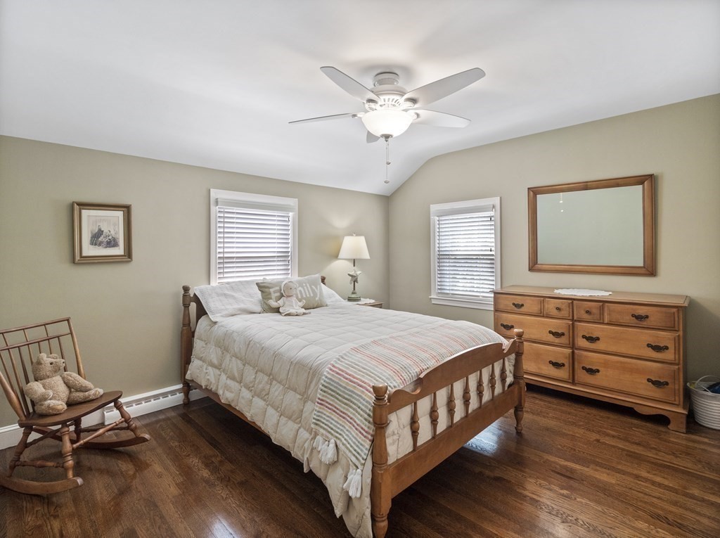 43 Windsor Road Stoneham, MA 02180 - Photo 27 of 42 a bedroom with a bed and a dresser