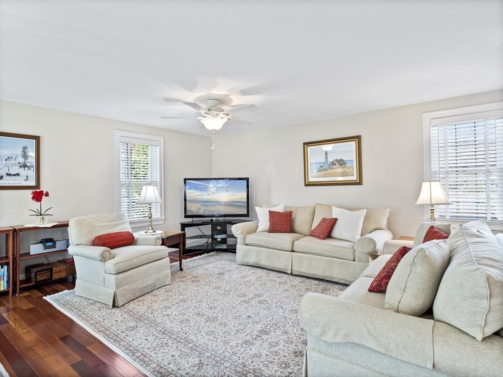 43 Windsor Road Stoneham, MA 02180 - Photo 34 of 42 a living room with furniture a couch and a flat screen tv