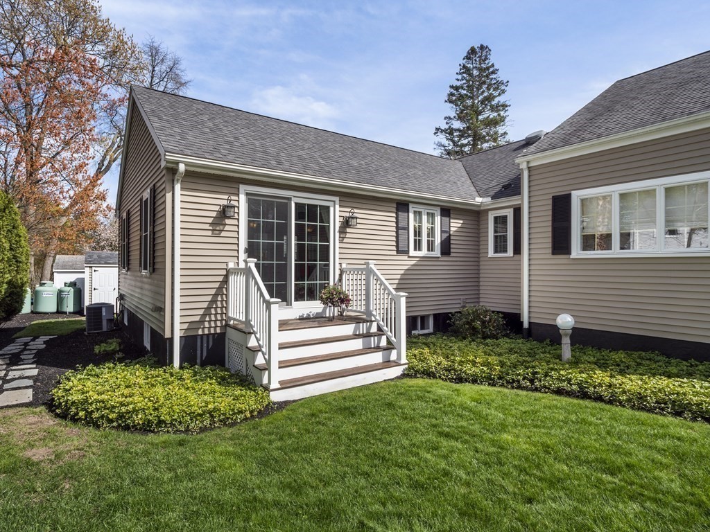 43 Windsor Road Stoneham, MA 02180 - Photo 37 of 42 a front view of a house with a garden