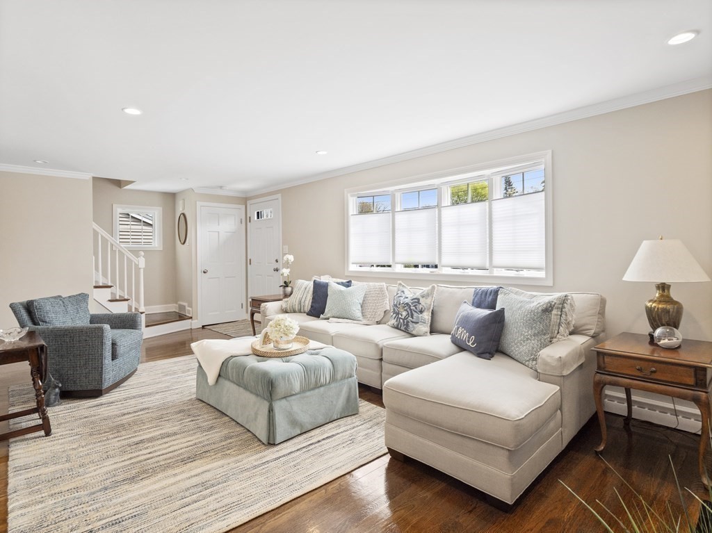 43 Windsor Road Stoneham, MA 02180 - Photo 4 of 42 a living room with furniture and a large window