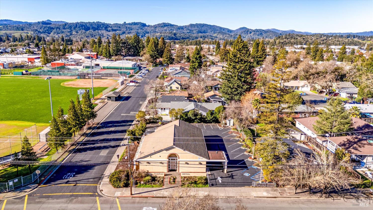 a view of a city with mountains in the background