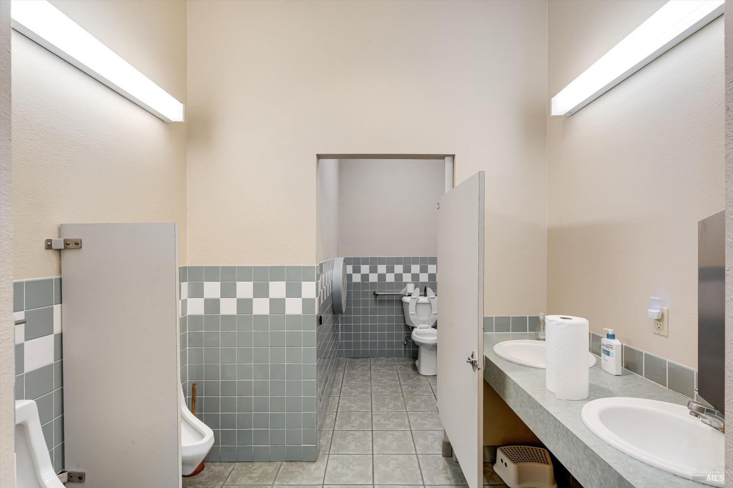 1105 University Avenue Healdsburg, CA 95448 - Photo 18 of 29 a bathroom with a sink a toilet and shower