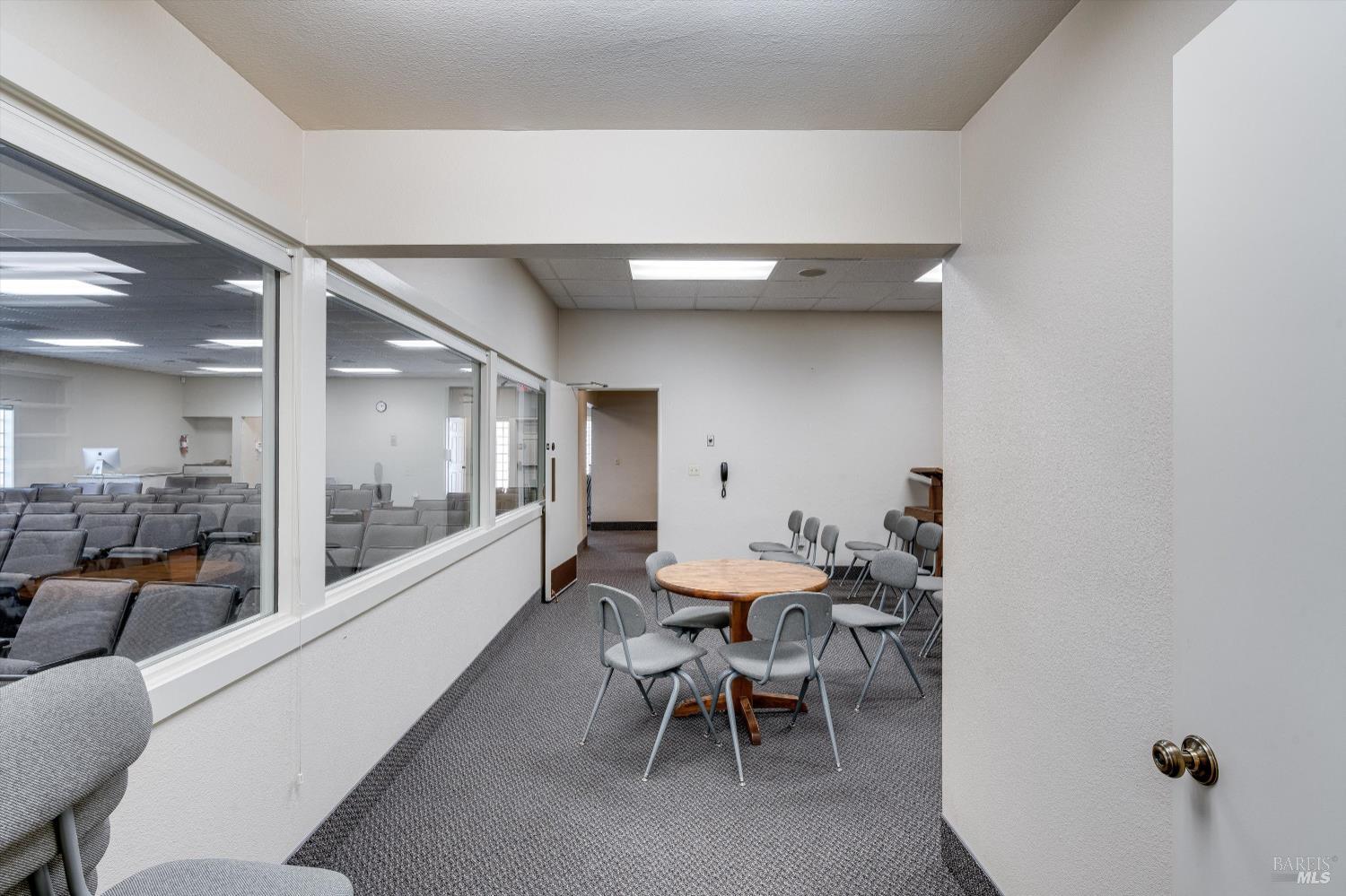 1105 University Avenue Healdsburg, CA 95448 - Photo 21 of 29 a dining room with furniture and a large window