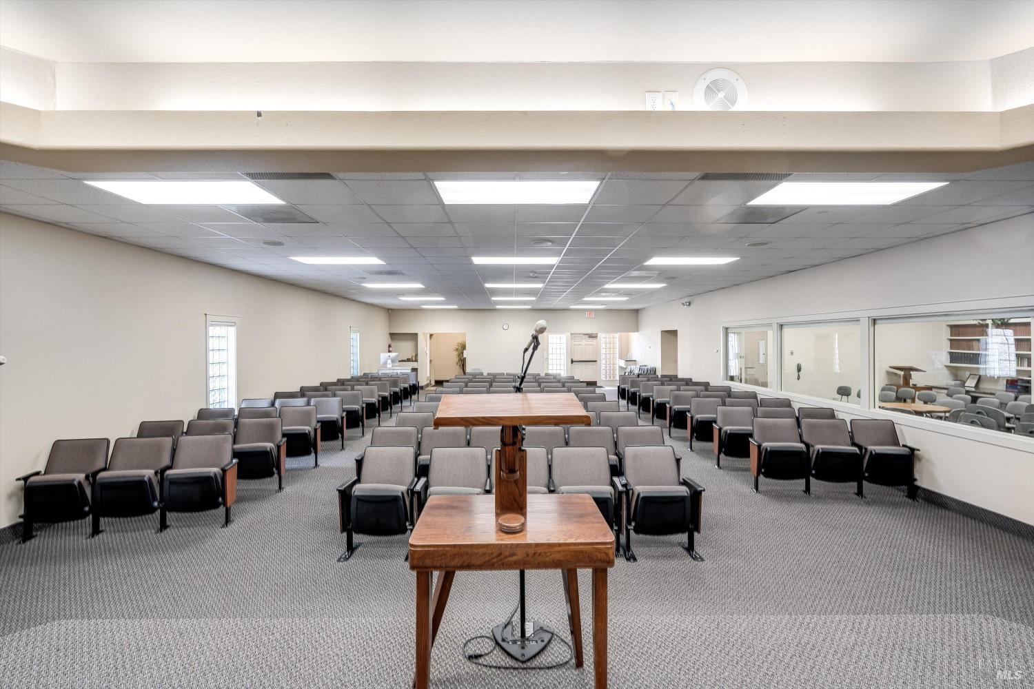 1105 University Avenue Healdsburg, CA 95448 - Photo 22 of 29 a large room with lots of furniture and a chandelier